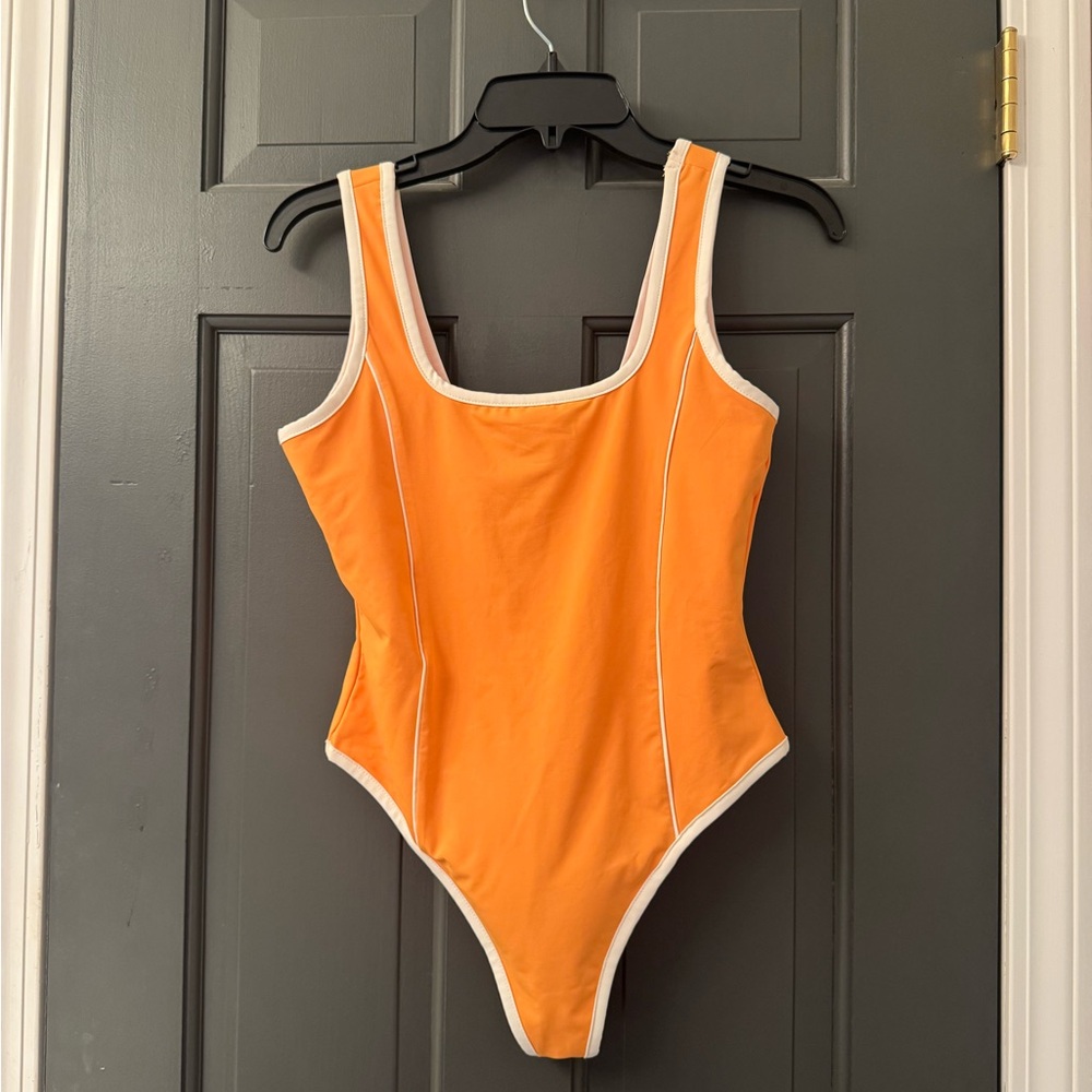 Kittenish one piece swimsuit